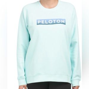 Peloton M size crew neck pullover. New with tags. Teal color. Runs larger.